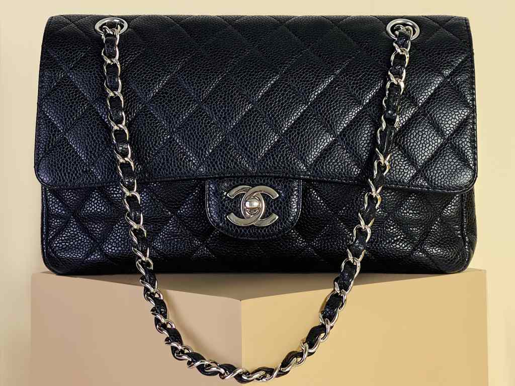Bolsa Chanel Flap. Clique na imagem e confira mais modelos da marca!
