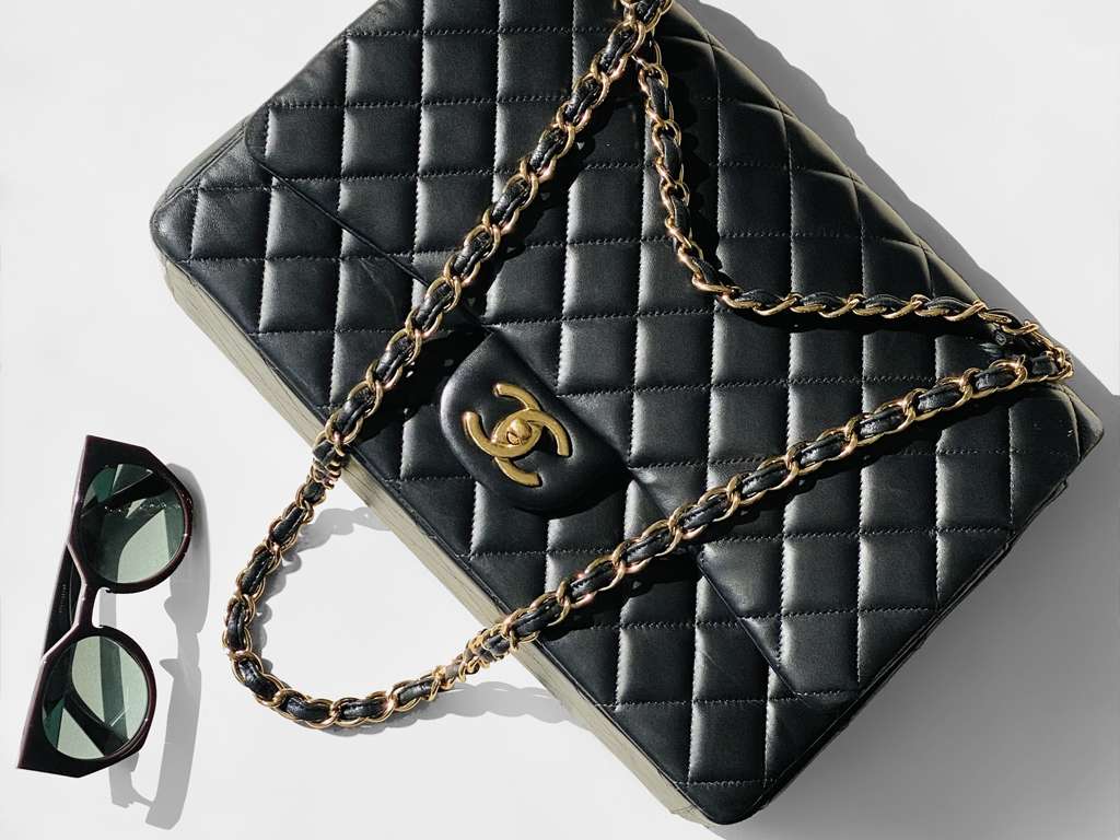 Bolsa Chanel Double Flap. Clique na imagem e confira criações da marca!