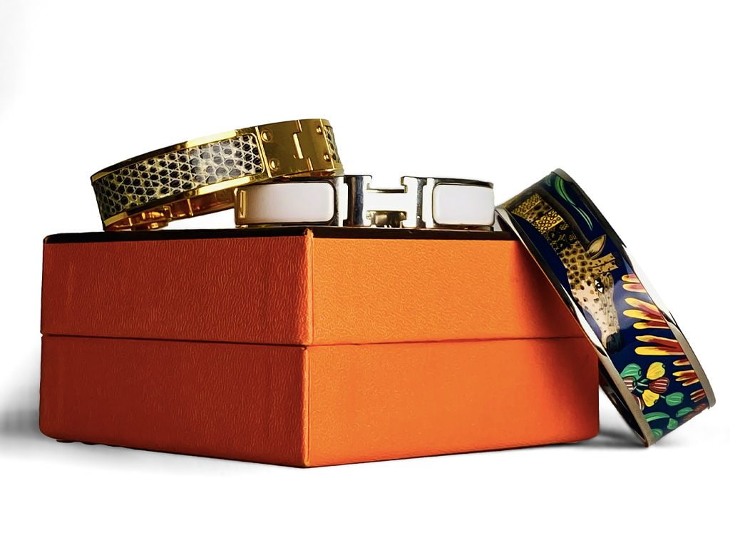 Braceletes Clic-Clac Hermès. Clique na imagem e confira criações da marca!