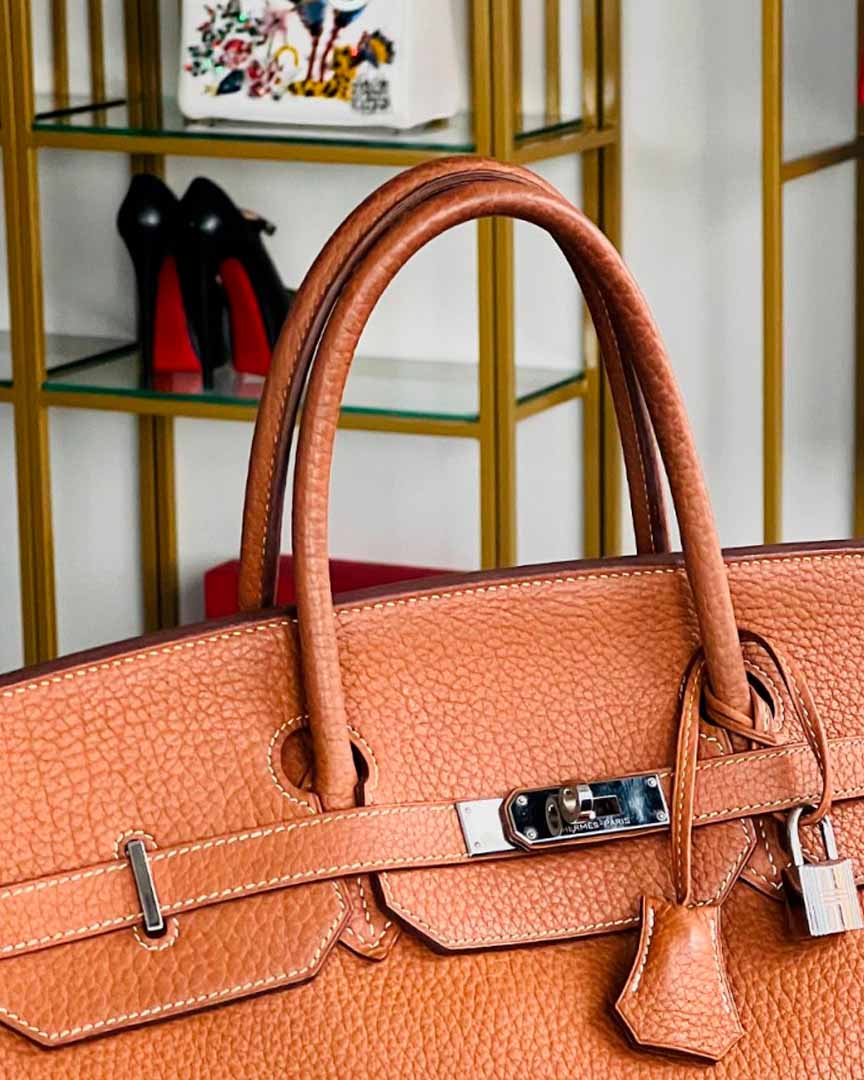 Bolsa Hermès e Sapato Louboutin.