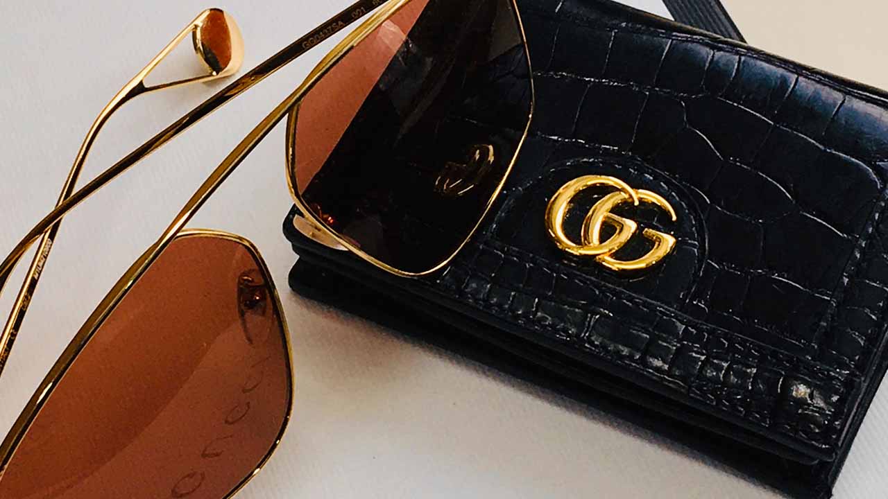 Carteira de Marca de Luxo Gucci.