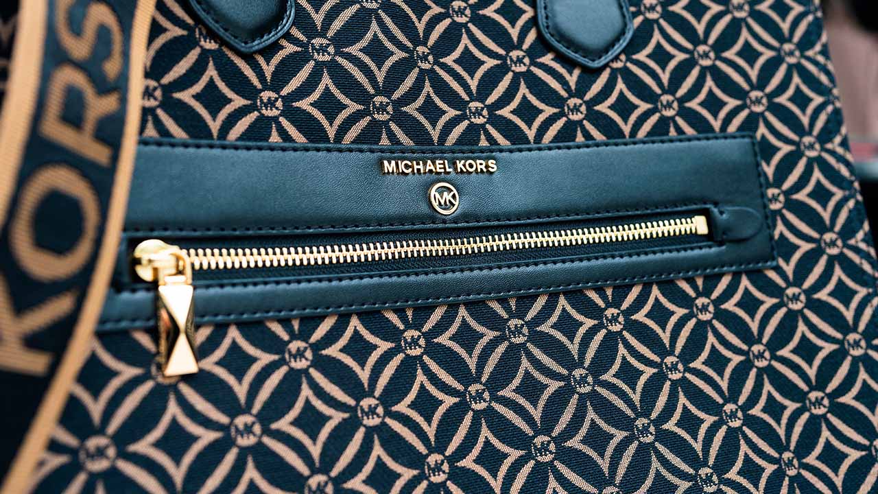 A Origem da Marca MK: Quando e Onde surgiu a Michael Kors?