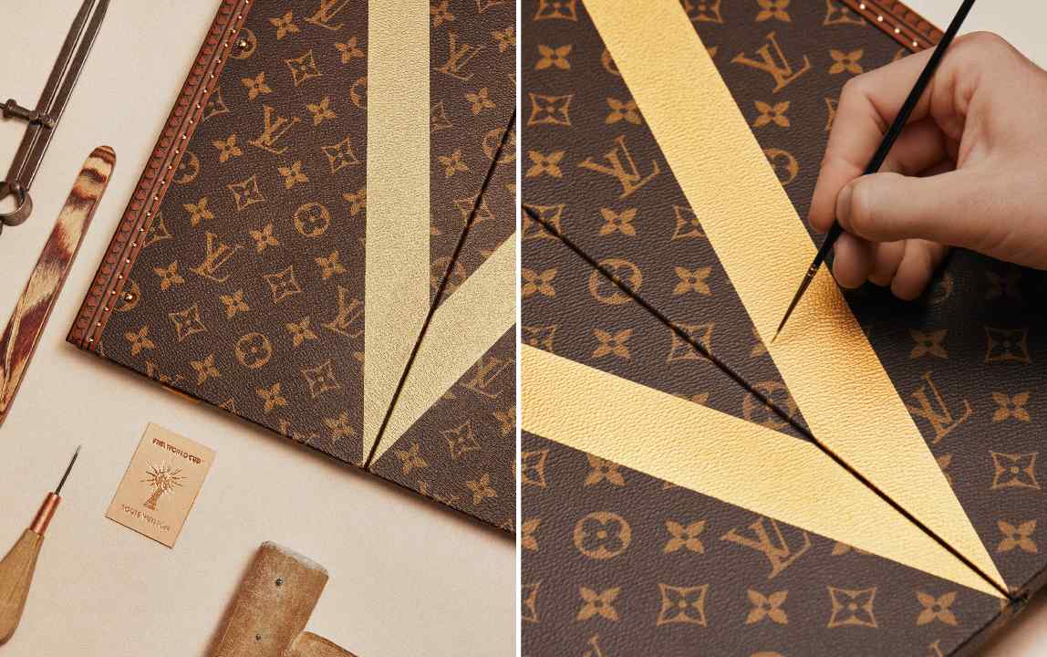 Artista pintando o V de vitória e de vuitton na maleta da taça da copa do mundo.