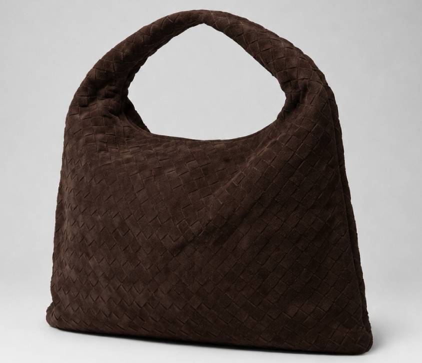 Bolsa Bottega Veneta Hop em camurça tendência slouchy 2026.